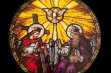 Stained glass window showing the Holy Trinity crafted for a private residence in Houston, Texas
