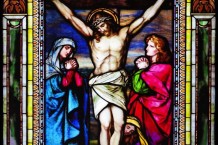 Jesus stained glass window showing His Crucifixion